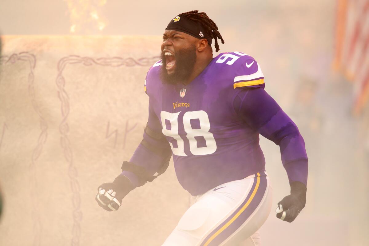 Linval Joseph enters the field before a 2017 Minnesota Vikings-New Orleans Saints game.
