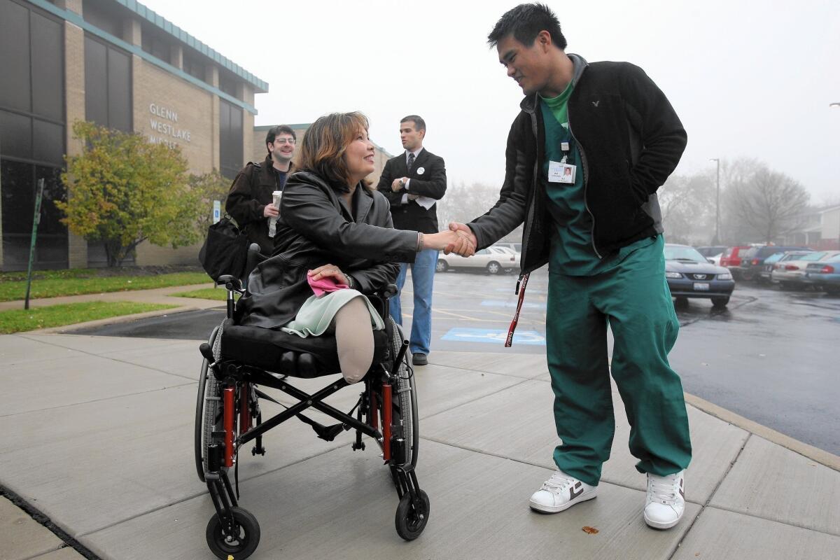 Rep. Tammy Duckworth (D-Ill.), shown on the campaign trail in 2006, recently upbraided a government contractor, accusing him of gaming the veterans disability system. Duckworth, an Army veteran, lost both legs in Iraq in 2004 when her helicopter was shot down.