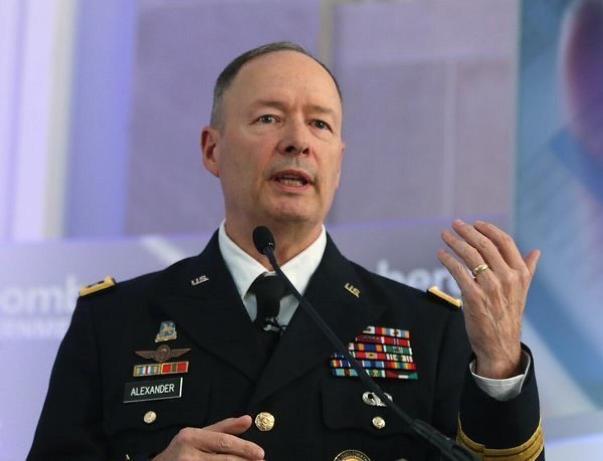 U.S. Army Gen. Keith Alexander, director of the National Security Agency, speaks during a conference in Washington.