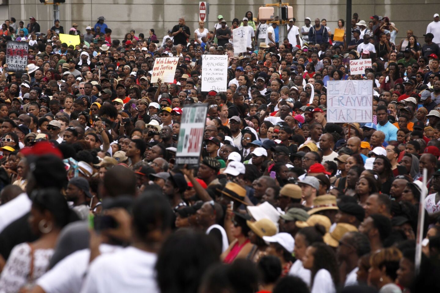 People rally in Atlanta, calling for civil rights charges against George Zimmerman.