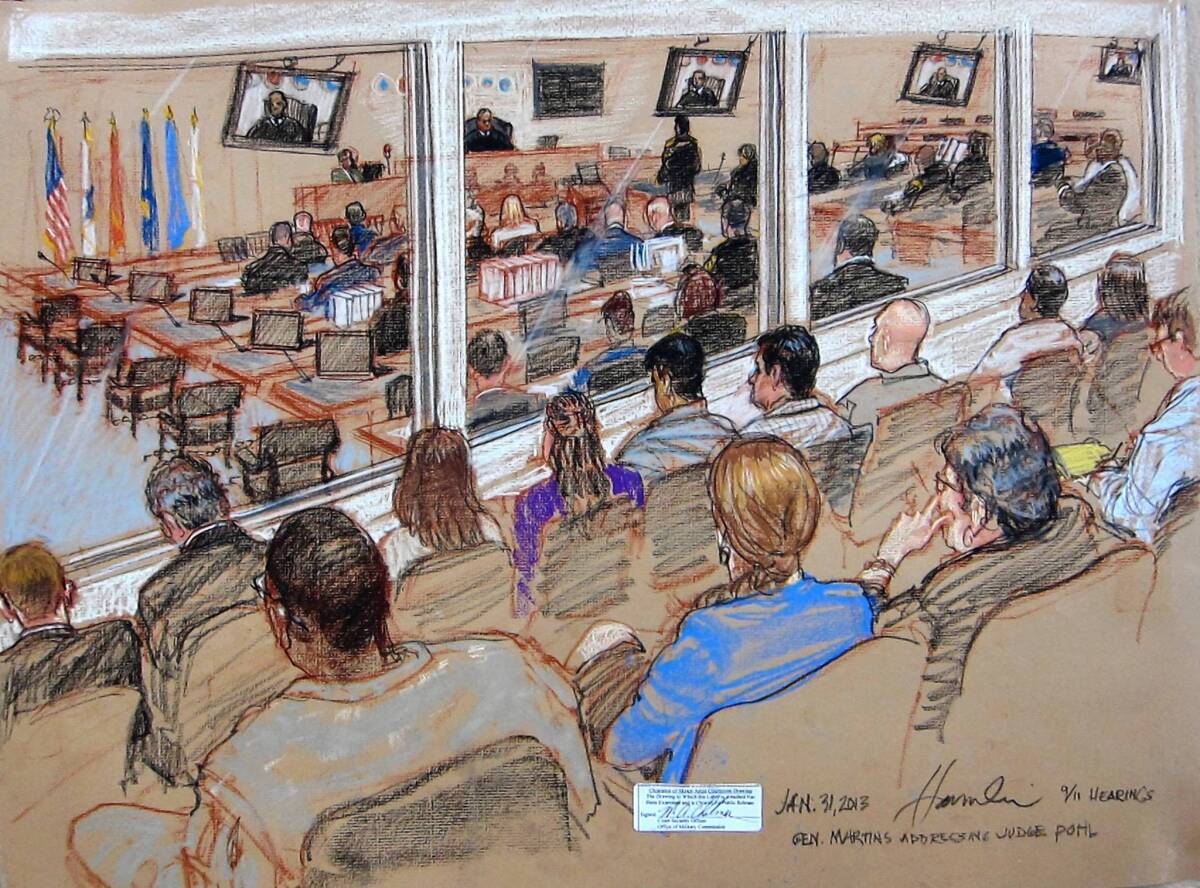 Observers watch the Sept. 11 hearings from a viewing gallery at the U.S. Naval Base at Guantanamo Bay, Cuba. The proceedings are broadcast to a courtroom in Ft. Meade, Md., with a 40-second delay for government censors.