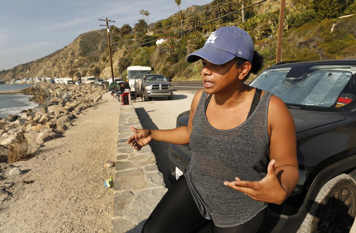 Nidia Greiss, 39, and her husband live out of their vehicle parked on Pacific Coast Highway at Las Tunas Beach in eastern Malibu.