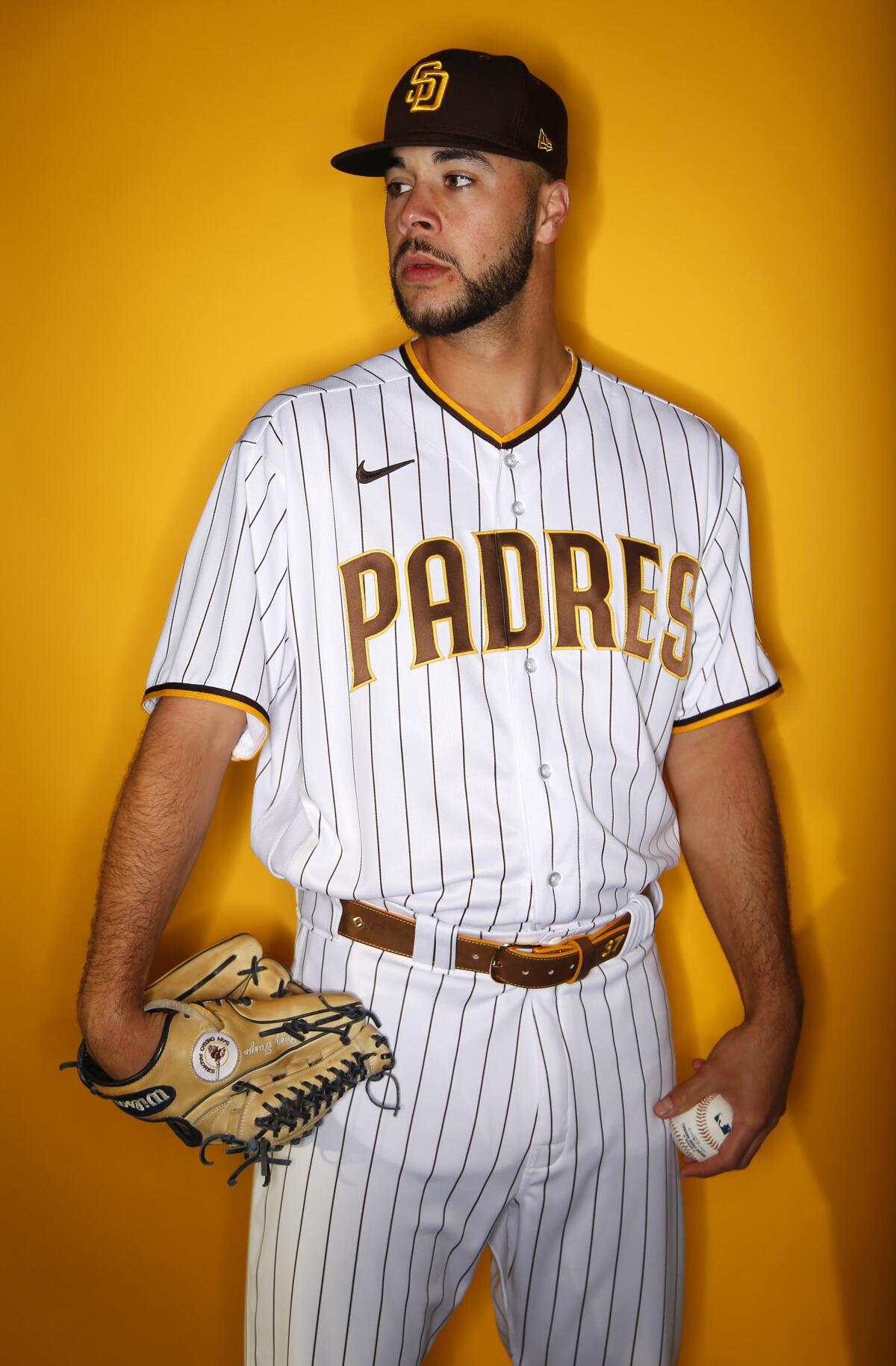 San Diego Padres starting pitcher Joey Lucchesi throws to the