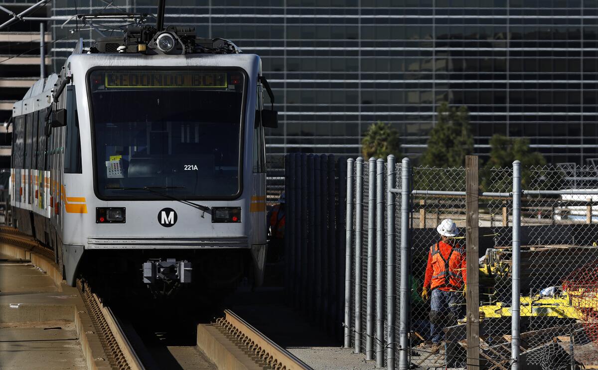 A Metro Green Line train leaves the Aviation/LAX station in Los Angeles.