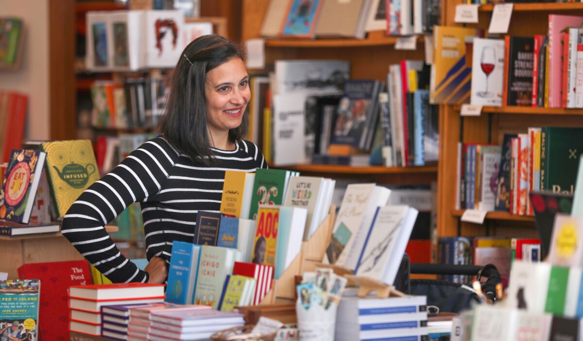 Jennifer Powell, co-owner of The Book Catapult, in South Park, works in the store on January 30, 2020.
