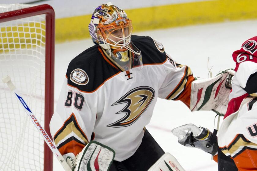 Ducks goalie Ilya Bryzgalov tries to keep focused on the puck during a game in December.
