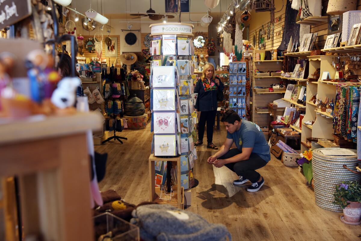 Shopping at Ten Thousand Villages, which showcases the work of disadvantaged artisans from around the globe.