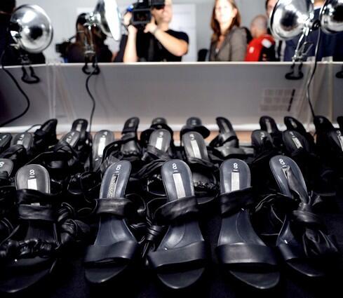 High heels are lined up for models before the BCBG Max Azria fashion show.