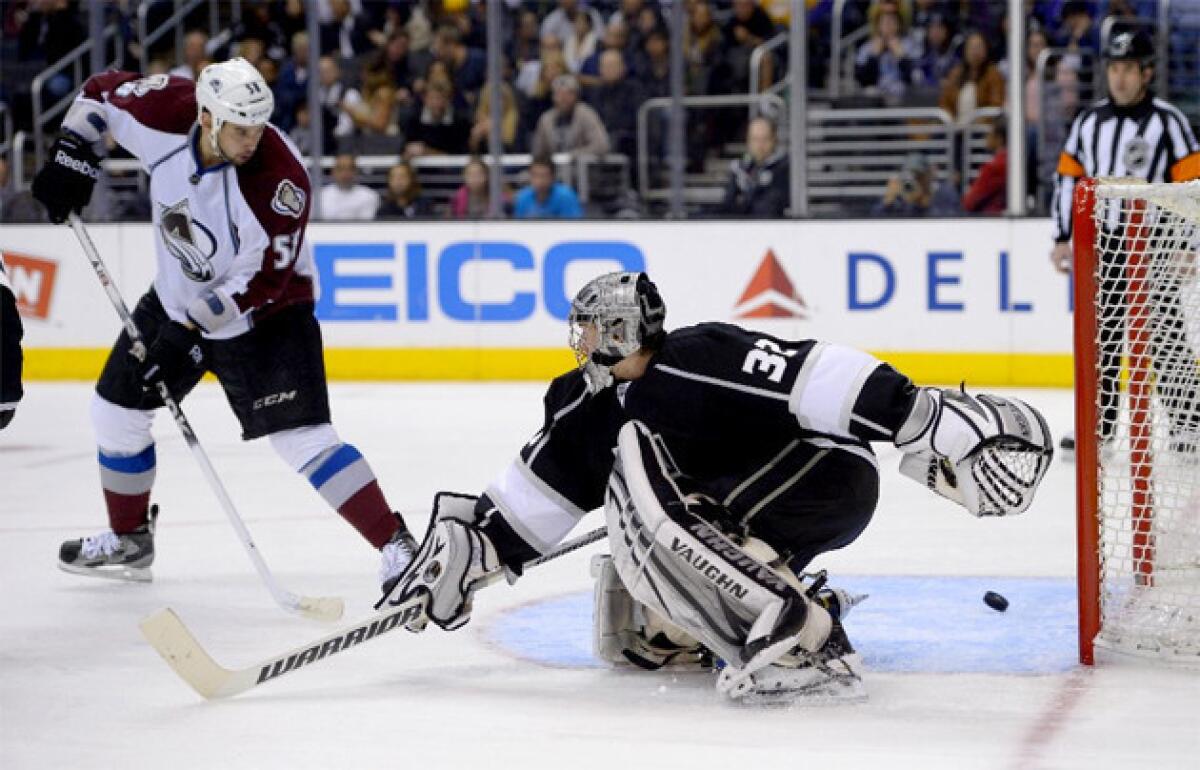 Kings goalie Jonathan Quick allows a goal to Colorado Avalanche left wing Patrick Bordeleau.