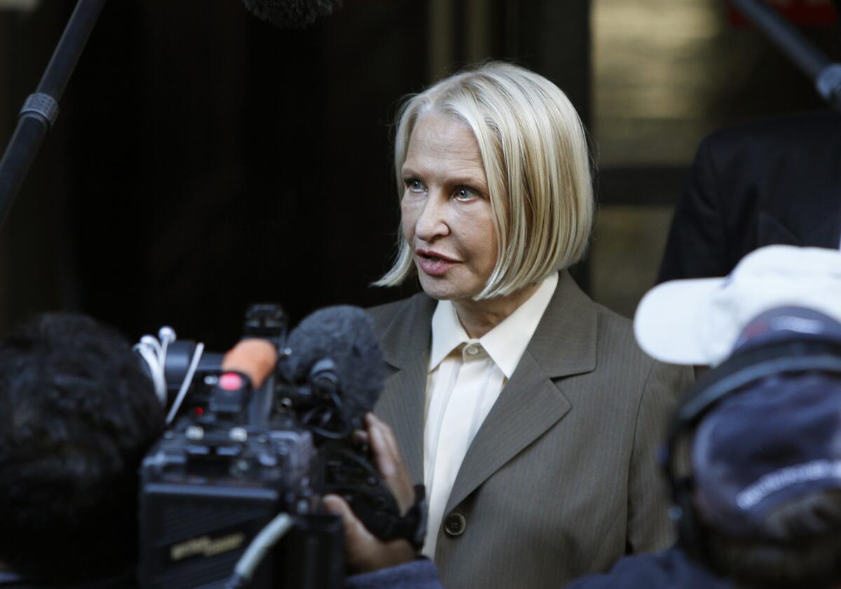 Dr. Khristine Eroshevich, a psychiatrist who had treated Anna Nicole Smith before the actress-model's death in 2007, speaks to the media in 2011. On Friday, a judge rejected calls from prosecutors to jail Eroshevich, reducing her conviction to misdemeanor conspiracy.