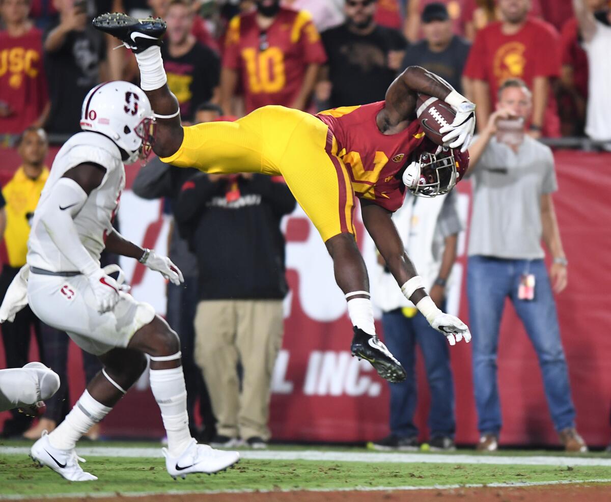 USC runing back Roanld Jones II scores a touchdown late in the fourth quarter against Stanford at the Coliseum.