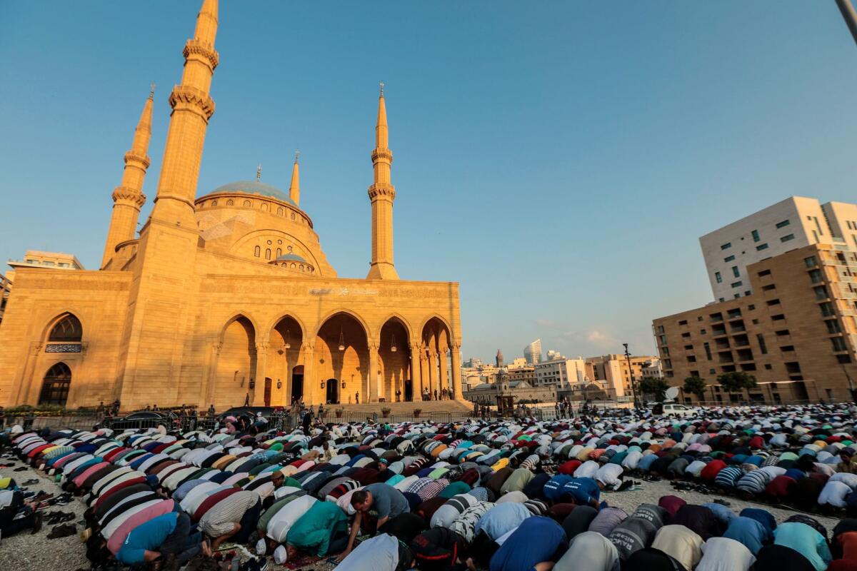 Lebanon: Muslims perform the Eid al-Adha prayer outside Al Ameen Mosque in downtown Beirut.