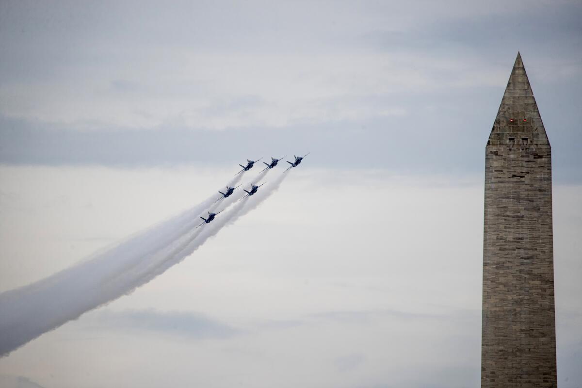 In this July 4, 2019, file photo, the Washington Monument is visible as the U.S. Navy Blue Angels fly over.