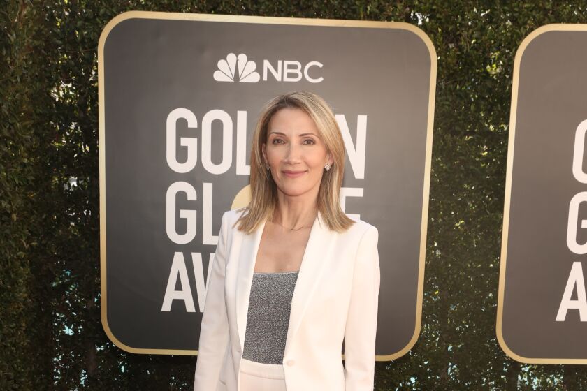 HFPA Vice President Helen Hoehne arrivse to the 78th Annual Golden Globe Awards on February 28, 2021.