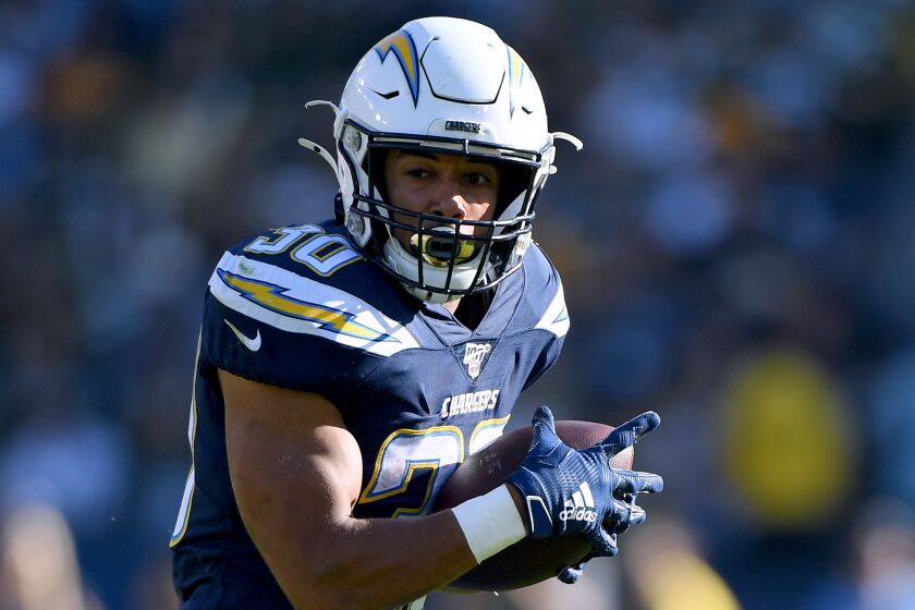Chargers running back Austin Ekeler makes a catch against the Packers