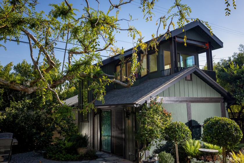Hollywood, CA - January 16: Architects Anupama Mann and Siddhartha Majumdar, of the architecture studio Wyota Workshop, have converted the garage behind the 1912 Craftsman home of Russell Brown, into a two-story ADU, in Hollywood, CA, photographed, Tuesday, Jan. 16, 2024. (Jay L. Clendenin / Los Angeles Times)