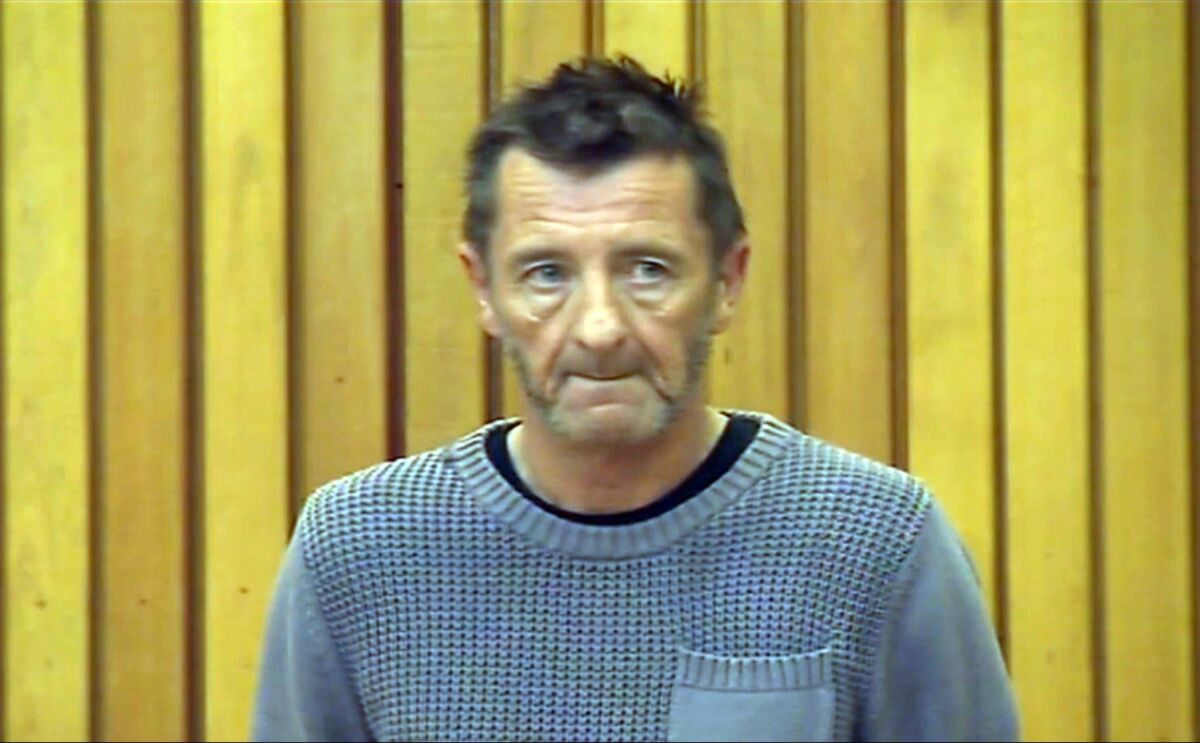 AC/DC drummer Phil Rudd in Tauranga District Court in New Zealand. Authorities have dropped the murder-for-hire charge against Rudd.
