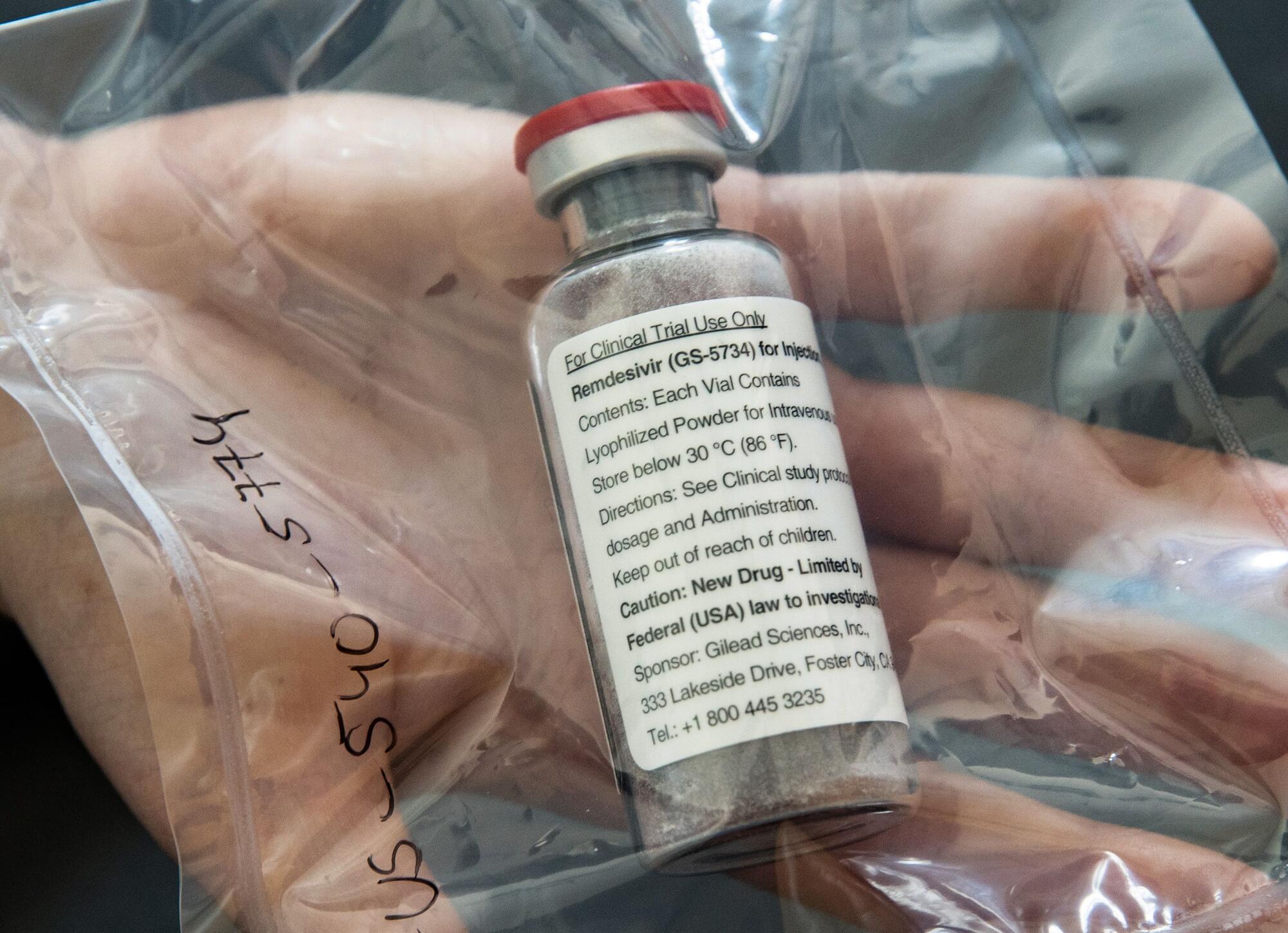 One vial of the drug Remdesivir shown during a press conference.