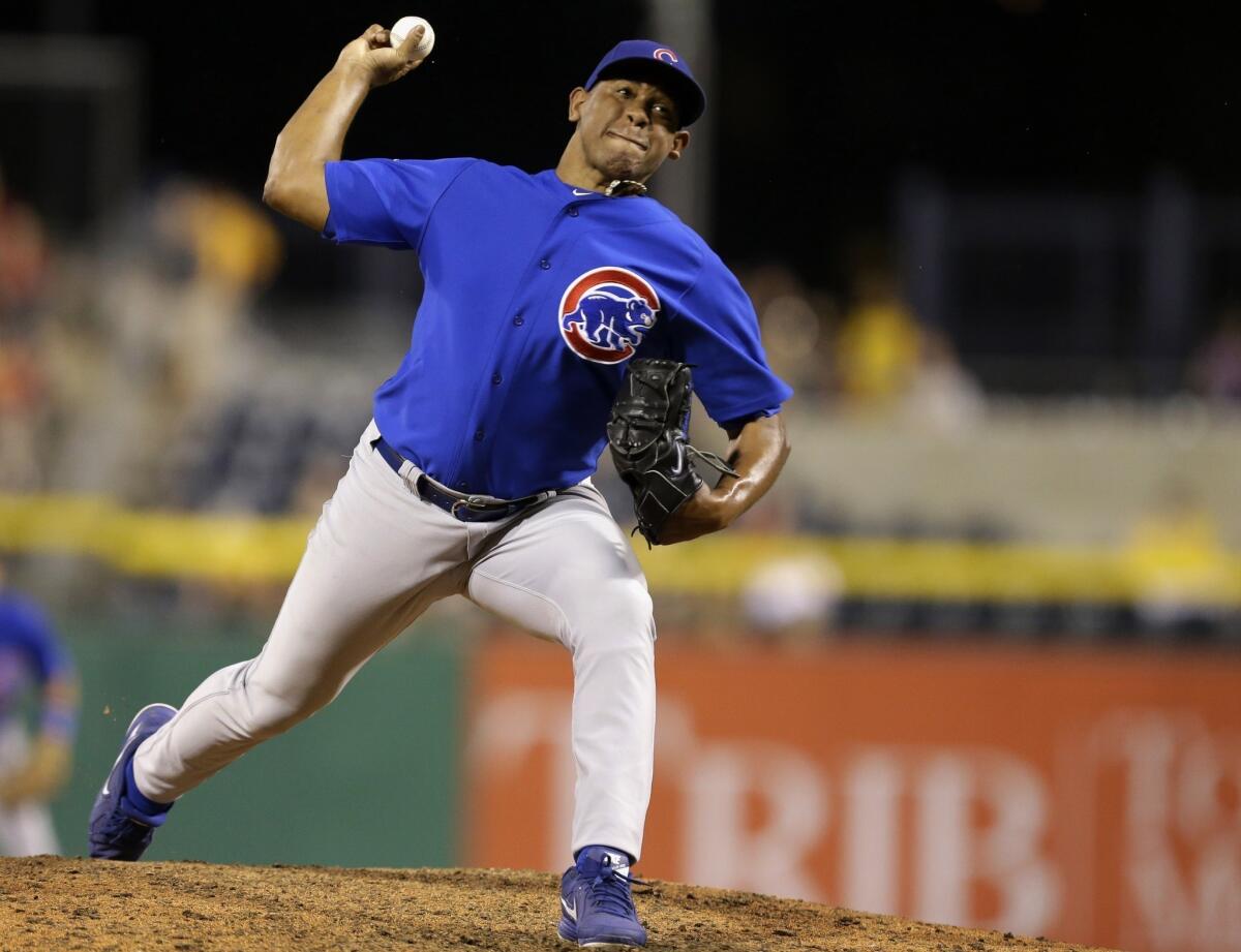 The Dodgers received closer Carlos Marmol, cash and cap space from the Chicago Cubs in exchange for Matt Guerrier.