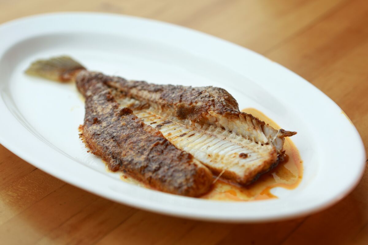 Chef Mike Reidy's local sand dab with smoked paprika butter at The Fishery in Pacific Beach.