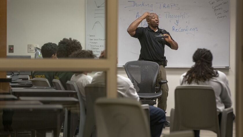 Probation officer William Agborsangaya conducts a leadership program in January at the Sacramento County Youth Detention Facility.