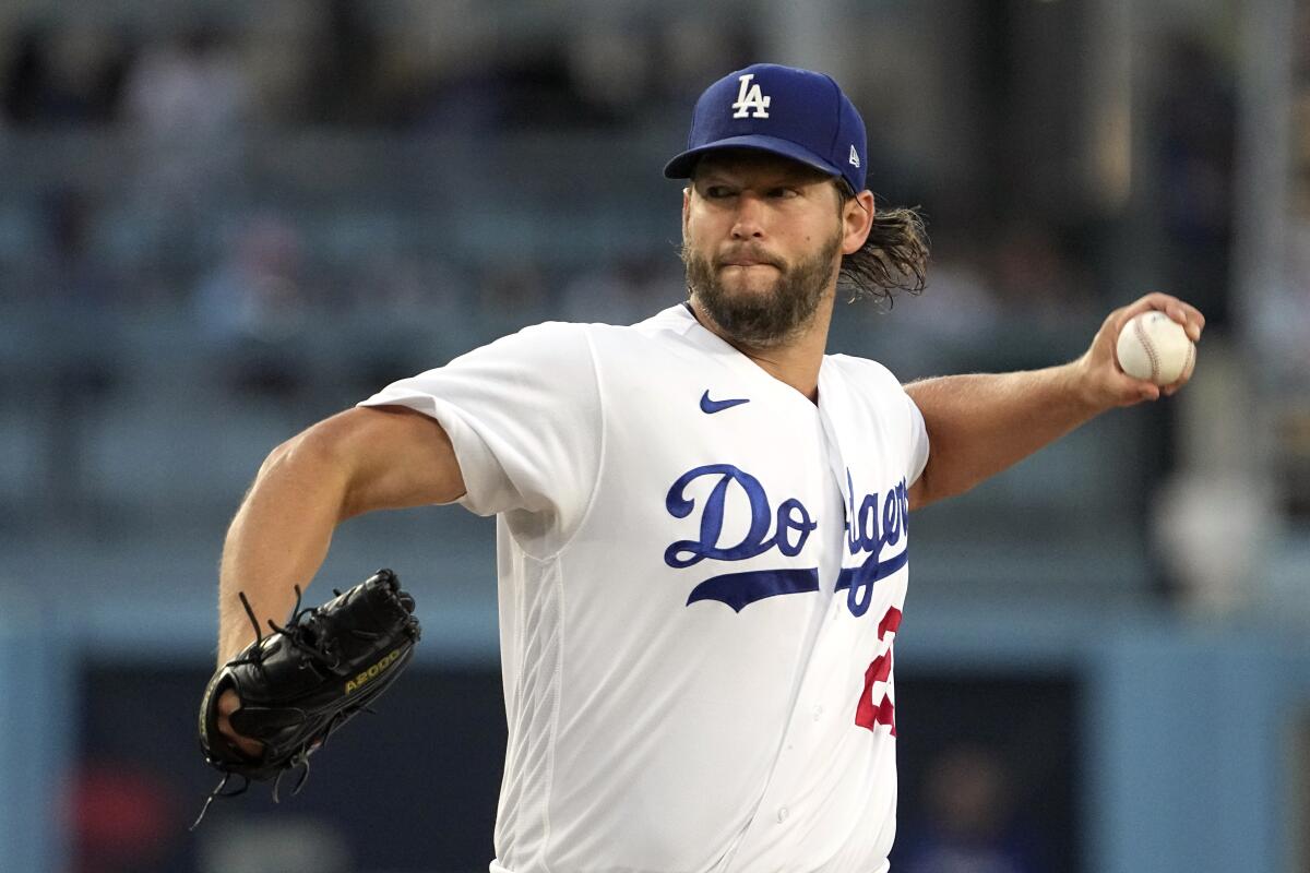 Dodgers starting pitcher Clayton Kershaw throws out against the Milwaukee Brewers on August 16, 2023 in Los Angeles.