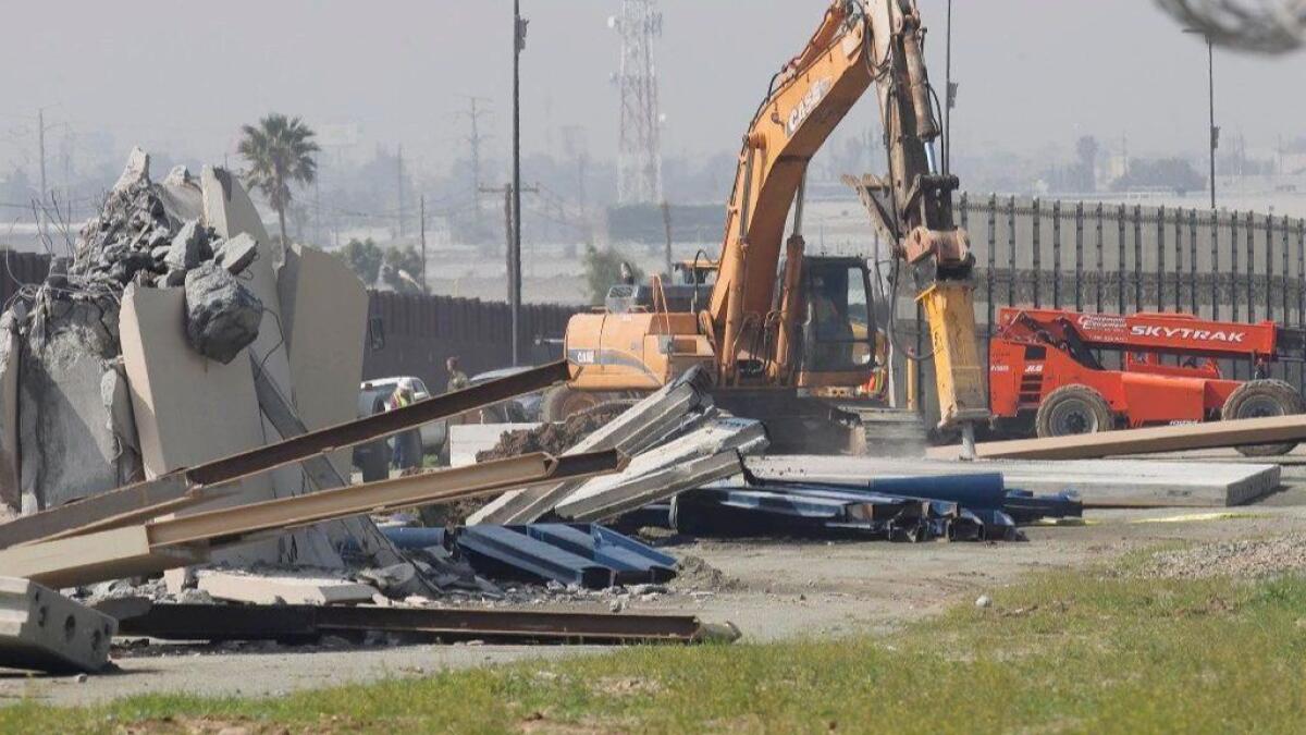 The border wall prototypes that were constructed in 2017 in San Diego between the U.S. and Mexico were knocked down Wednesday to make room for the construction of a secondary border wall about 50 yards north of the main border fence.