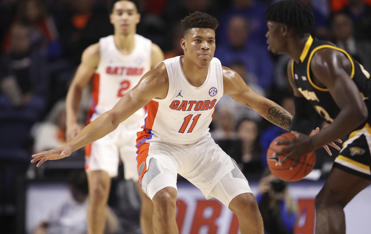 Florida forward Keyontae Johnson plays defense against Towson.