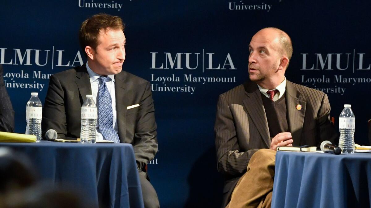 Challenger Nick Melvoin, left, and Los Angeles school board President Steve Zimmer disagree on proposed laws that would place new rules on charter schools. Zimmer is for them; Melvoin against.