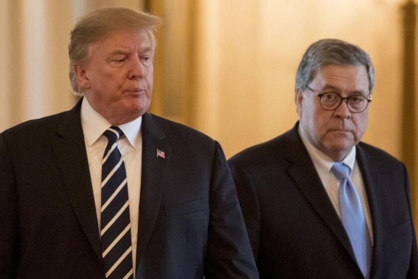 President Donald Trump and Attorney General William Barr arrive for a Public Safety Officer Medal of Valor presentation ceremony in the East Room of the White House in Washington, Wednesday, May 22, 2019.(AP Photo/Andrew Harnik)