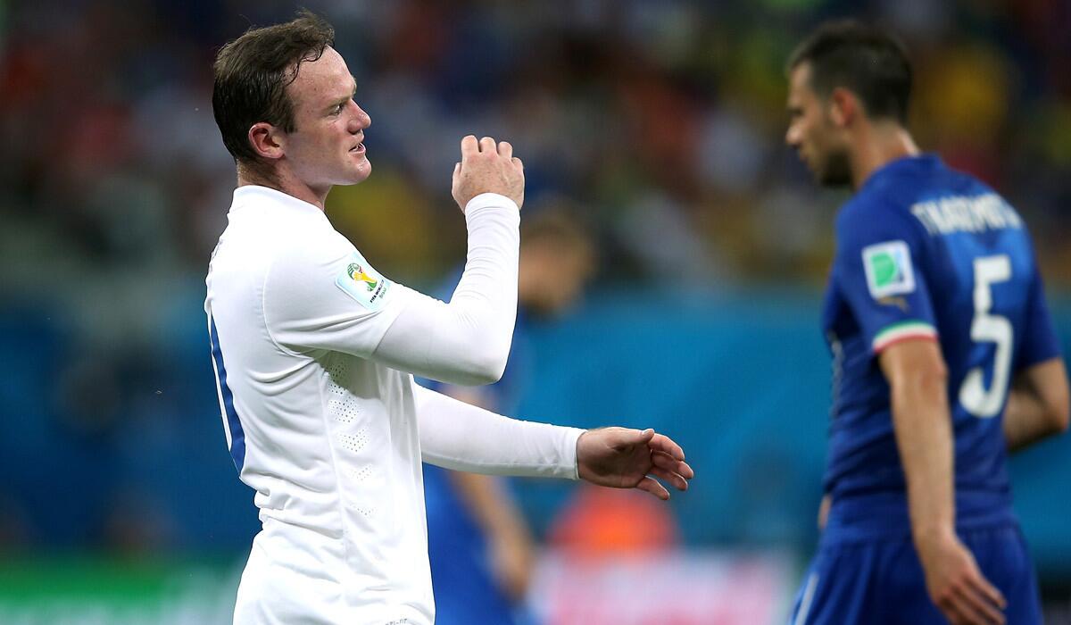 England forward Wayne Rooney reacts after missing a shot on goal against Italy in a World Cup Group D game last week.