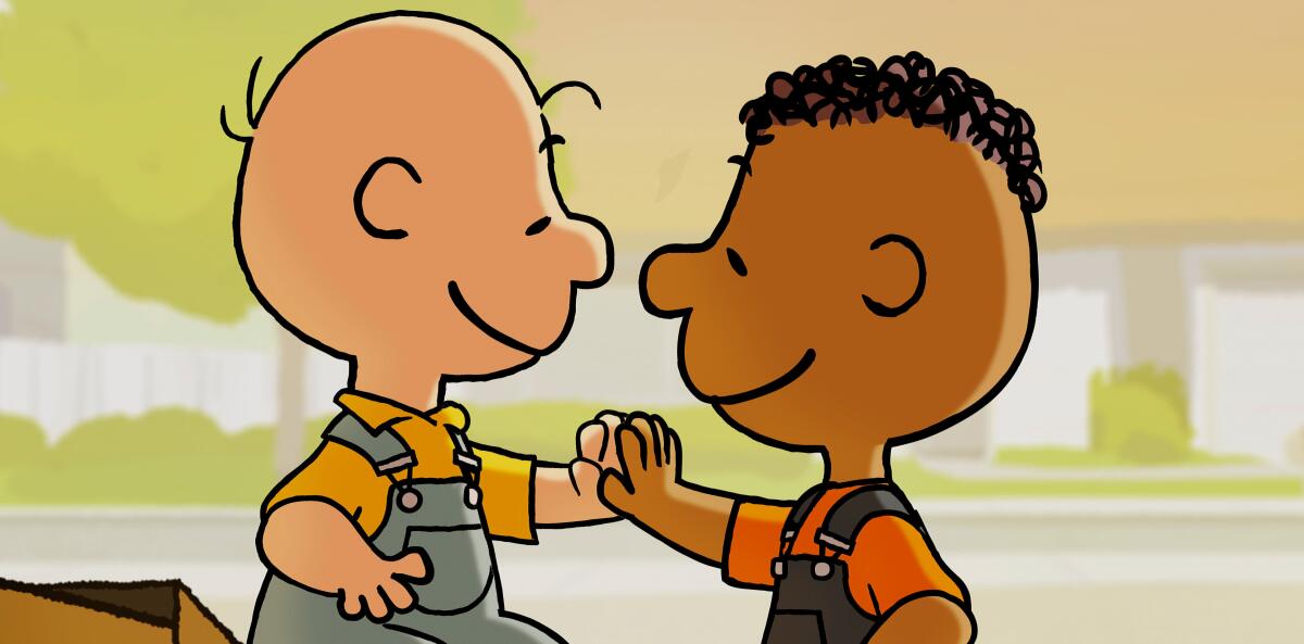 Charlie Brown and Franklin Armstrong high-five.