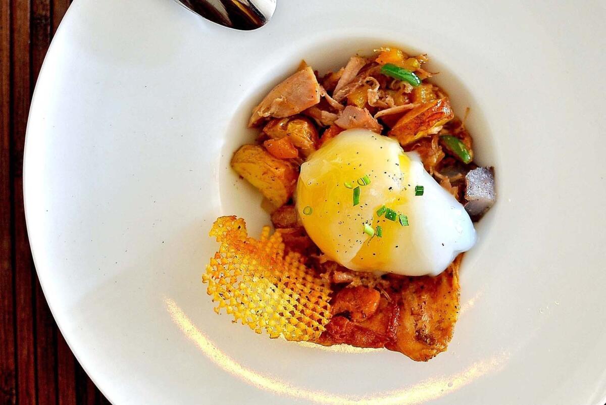 The duck hash is topped with a duck egg at AltaEats in Pasadena.