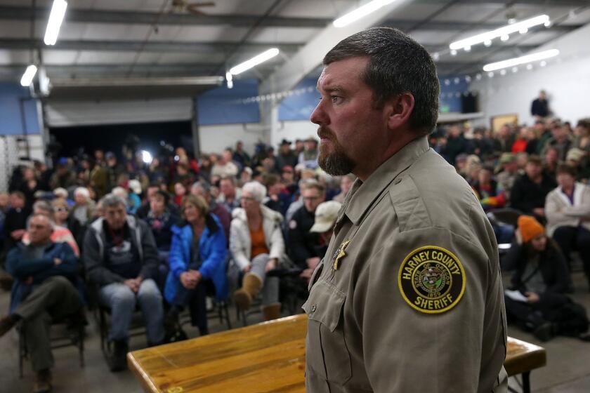 Harney County Sheriff David Ward meets with residents at a community gathering in Burns, Ore., the first since armed occupiers took over the nearby headquarters of a federal wildlife refuge.
