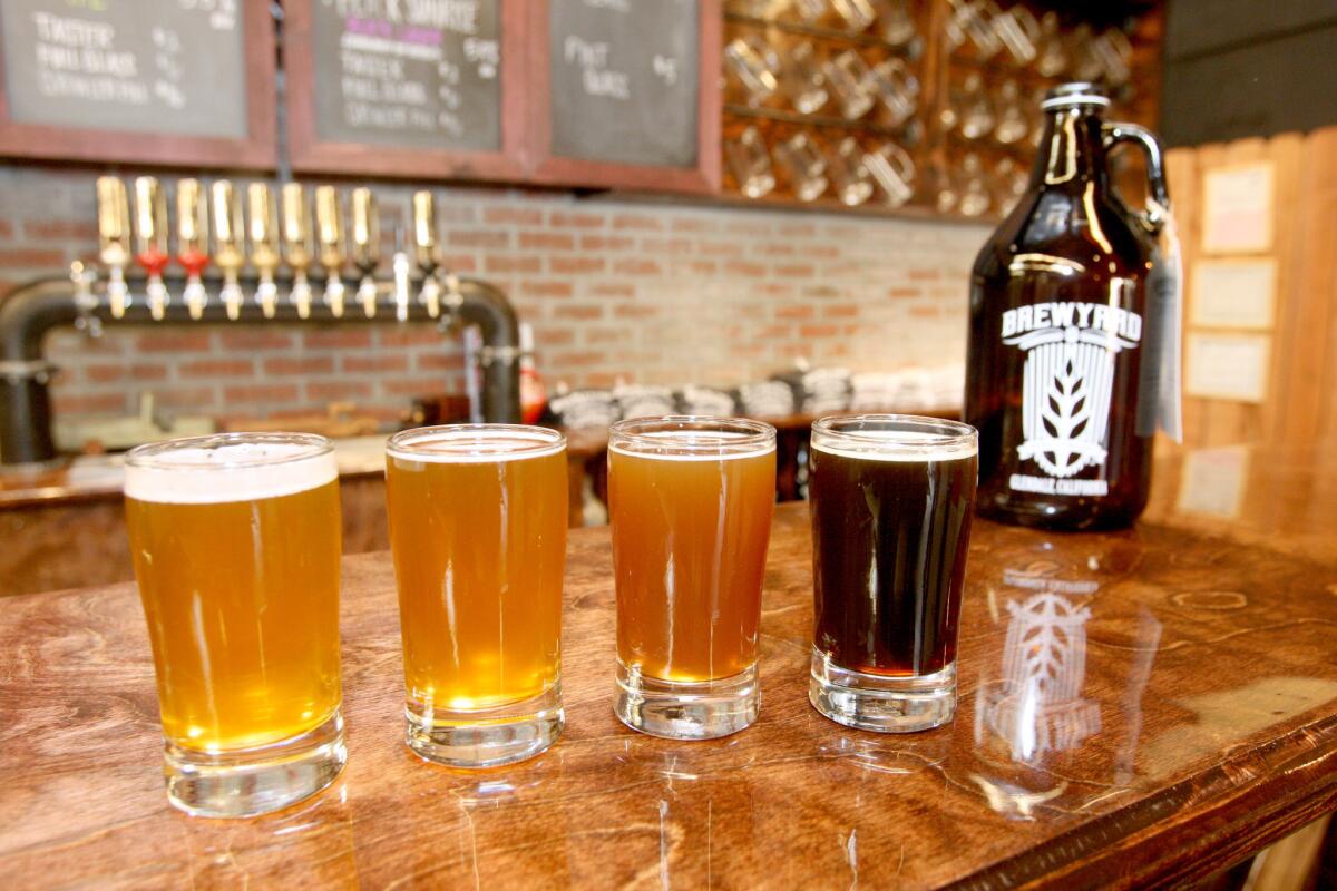 Brewyard Beer Co. beers, left to right, Tropico Saison, Split Shift IPL, Soul Cal Hoopy Cali Common and Black Sunrise lager, are showcased on Tuesday, Nov. 17, 2015. The brewery at 909 Western Ave. in Glendale is the first craft beer brewery to open within city limits.
