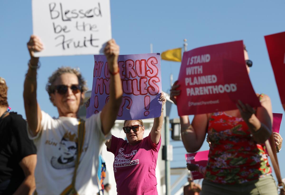 A protest occurred at Main Beach in Laguna Beach to demonstrate against the Supreme Court decision overturning Roe vs. Wade.
