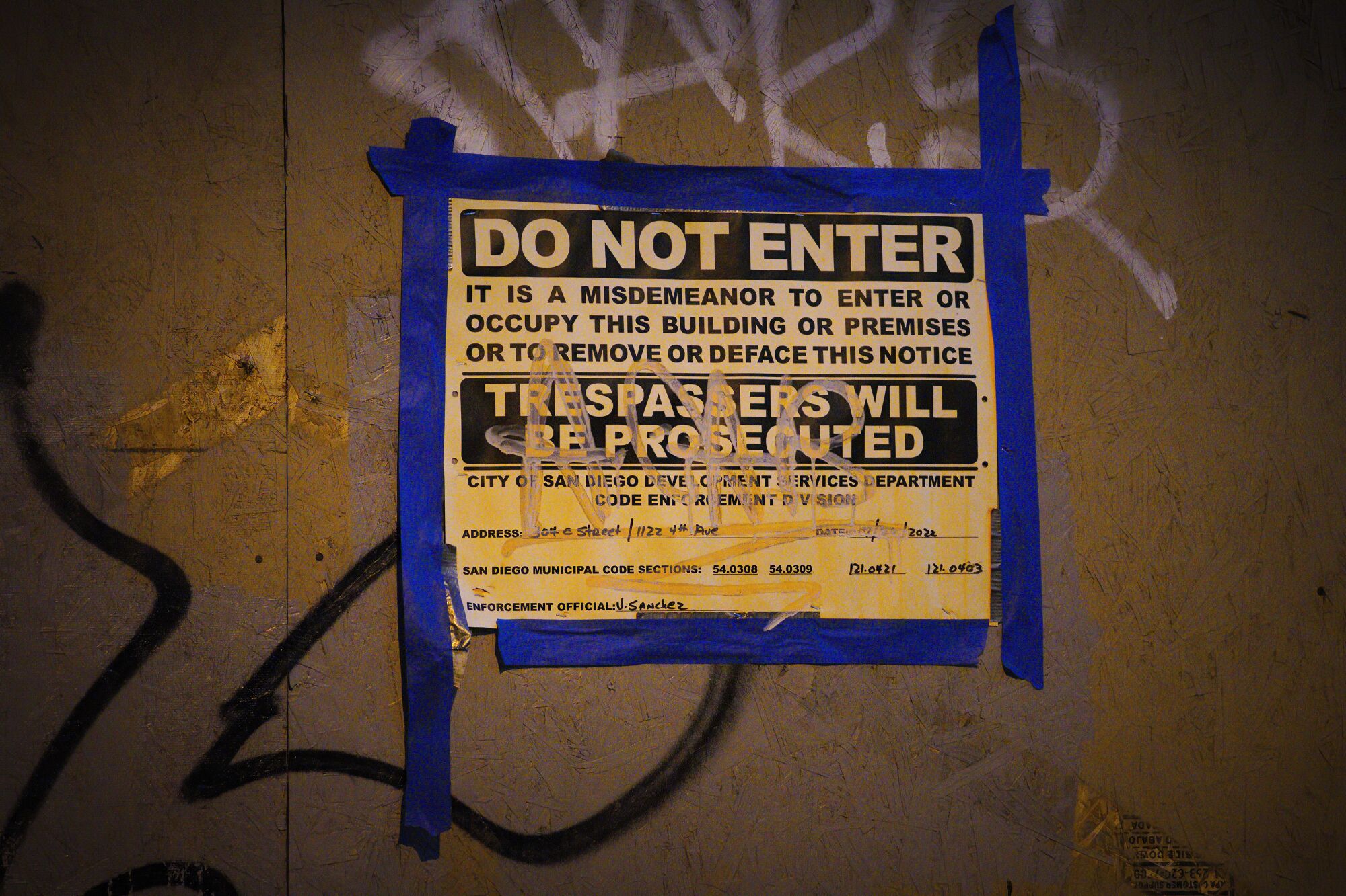 “Do Not Enter” signs were taped on the exterior walls of the California Theatre property in downtown.