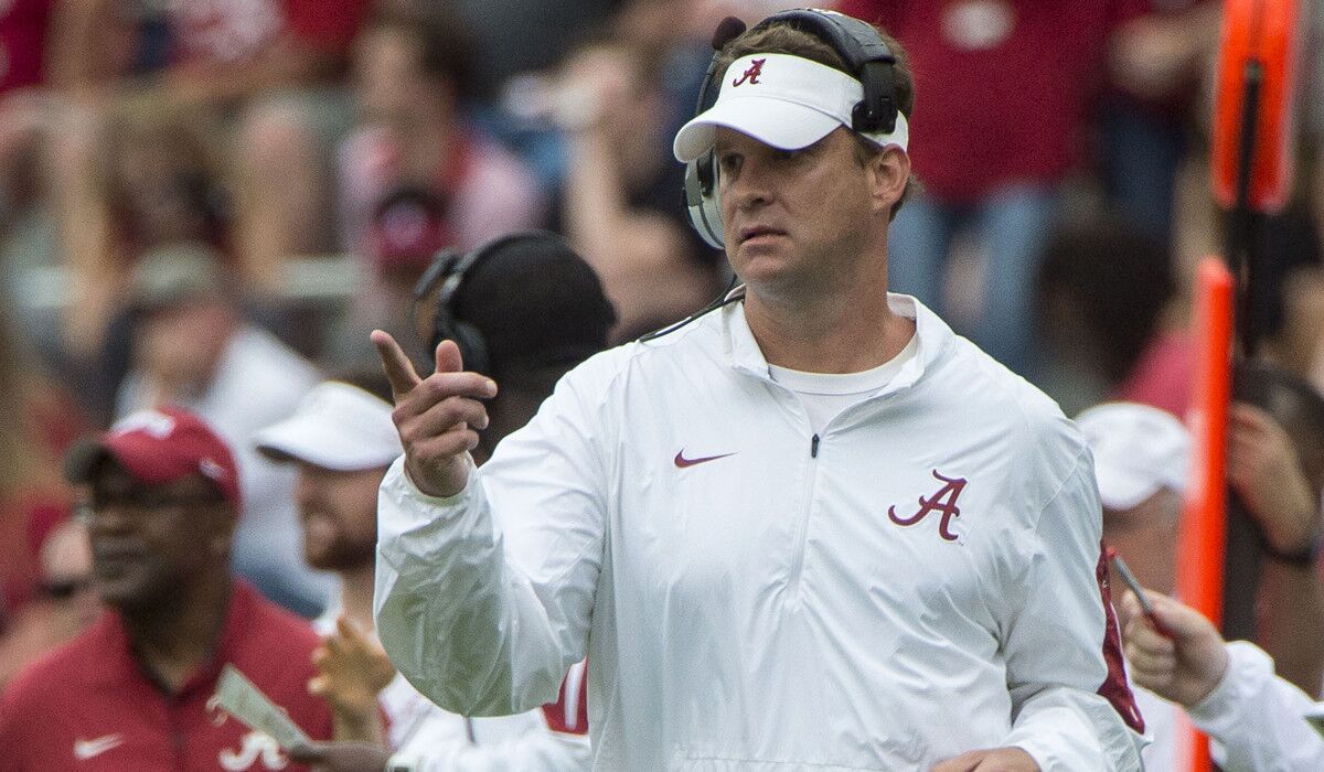 Alabama offensive coordinator Lane Kiffin signals in during the second half of the team's spring game on April 16.