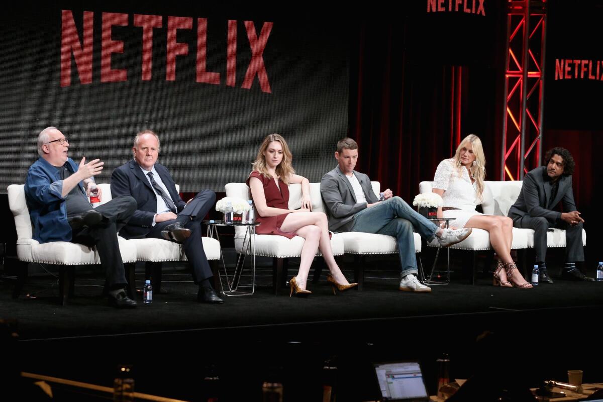 Co-creator/executive producer J. Michael Straczynski, left, executive producer Grant Hill, actors Jamie Clayton, Brian J. Smith, Daryl Hannah and Naveen Andrews speak onstage during the "Sense8" panel discussion at the Netflix portion of the 2015 Summer TCA Tour.