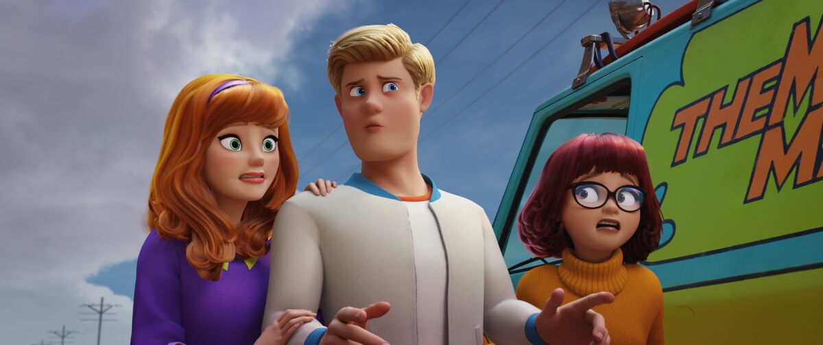 Daphne (voiced by Amanda Seyfried), Fred (Zac Efron) and Velma (Gina Rodriguez) in the movie "Scoob!"