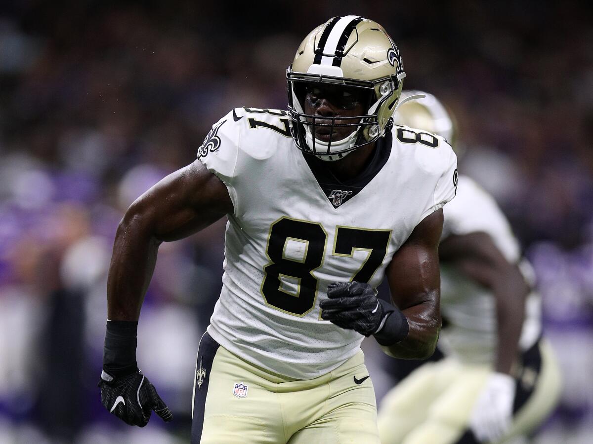 Saints tight end Jared Cook carries the ball during a preseason game against the Vikings on Aug. 9.