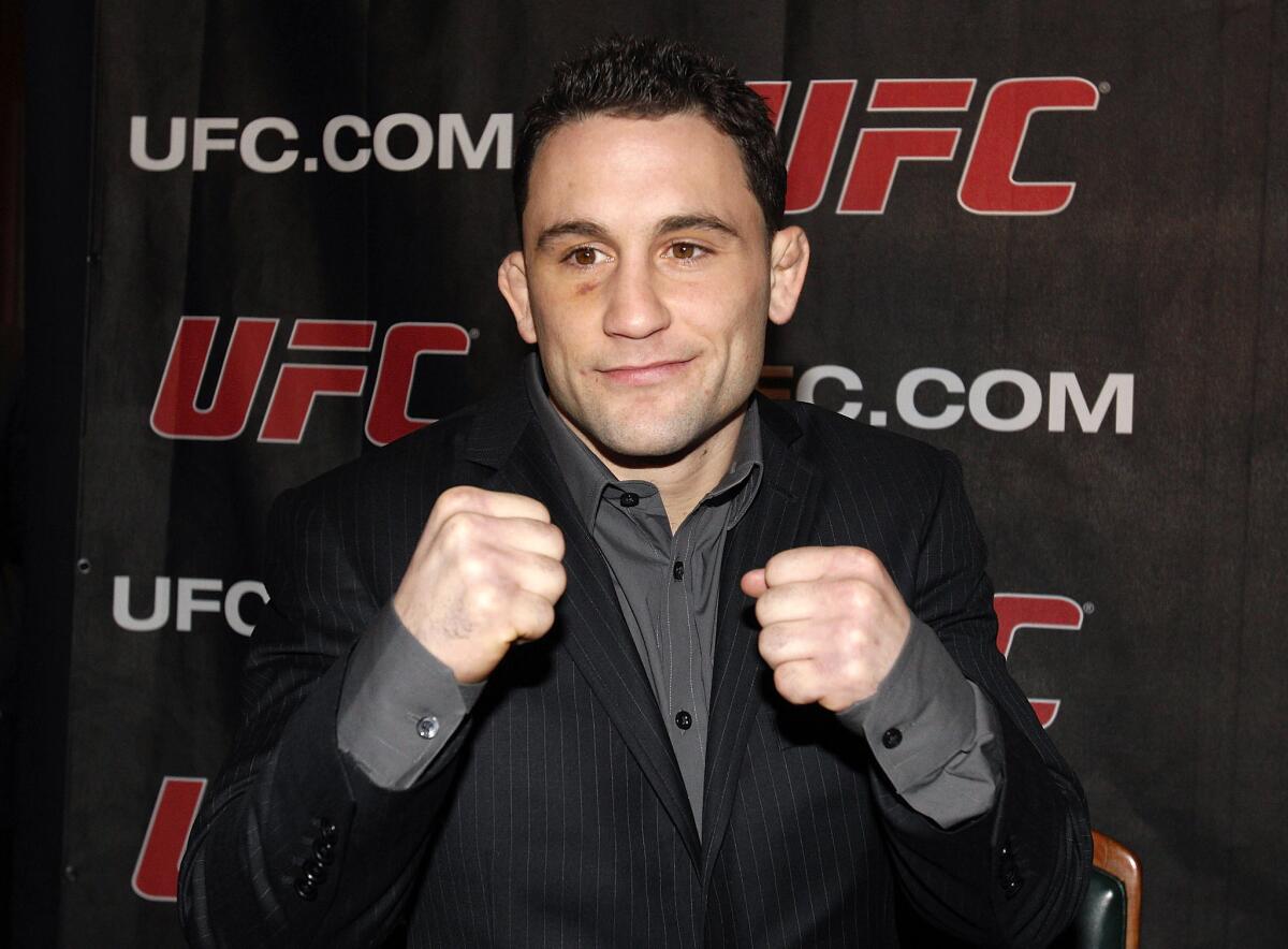 Frankie Edgar poses during a news conference in 2011.