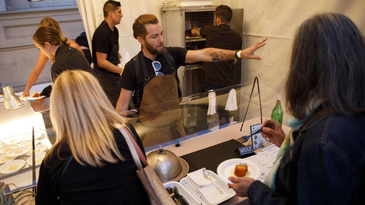 Marcel Vigneron, chef and owner, serves up crack potatoes from Wolf during The Taste on the Paramount Studios