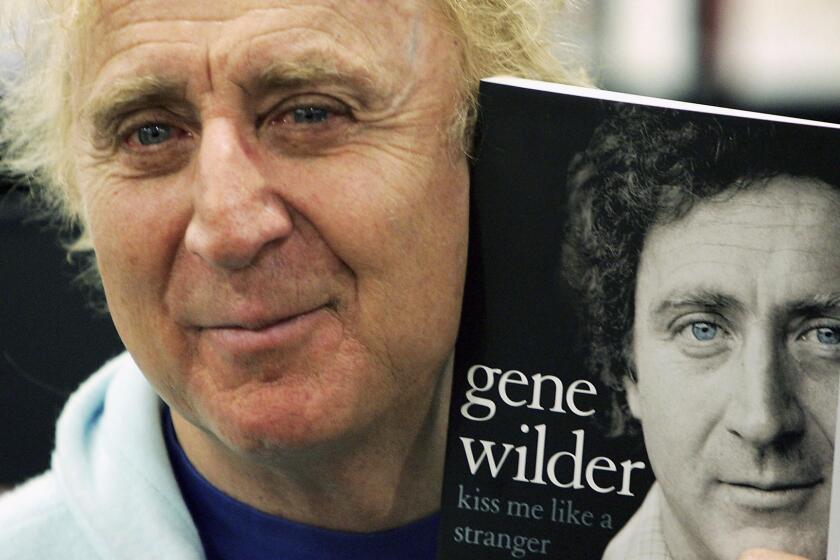 Gene Wilder poses as he signs copies of his autobiography "Kiss Me Like A Stranger" in London in 2005.