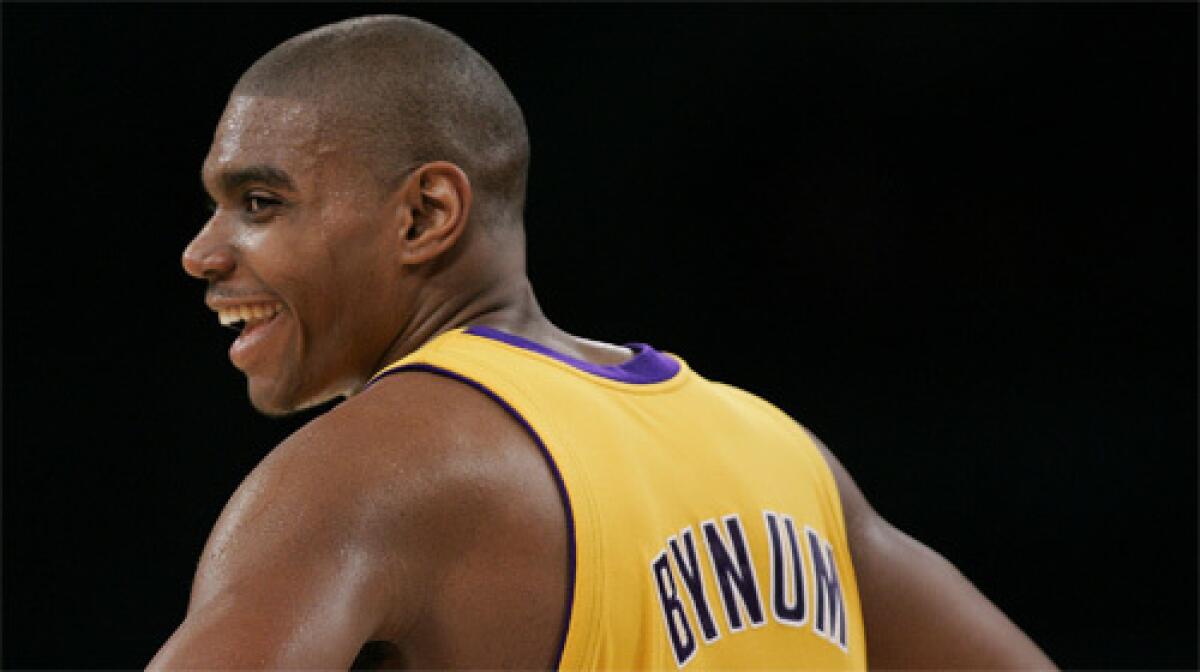 Lakers center Andrew Bynum flashes a smile toward the bench during game against the Milwaukee Bucks on January 11, 2008.