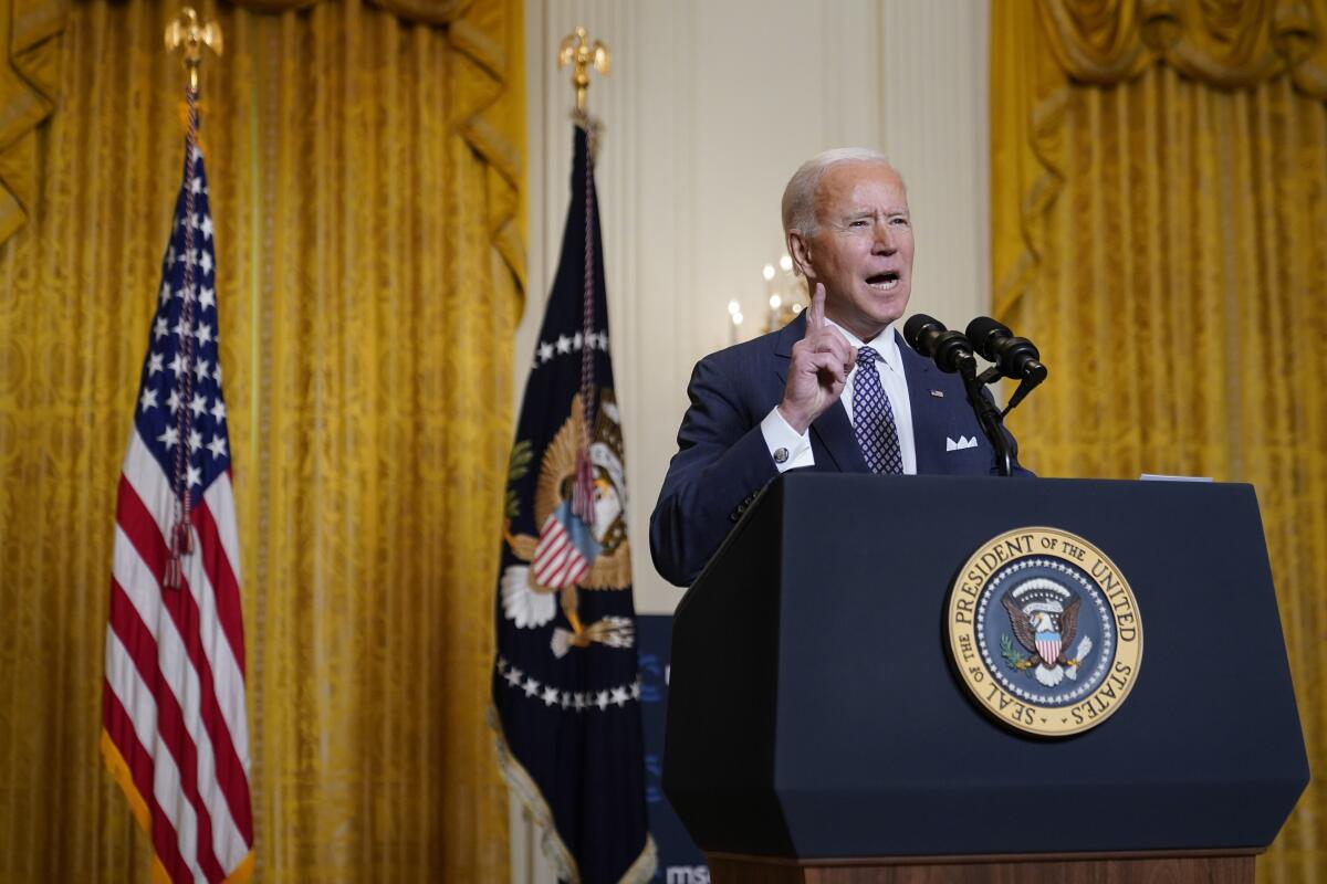 President Joe Biden speaks at the White House on Friday. 
