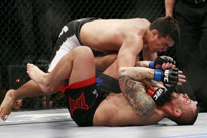 Lyoto Machida has the upper hand against Thiago Silva during their February 2009 UFC light-heavyweight fight in Las Vegas.