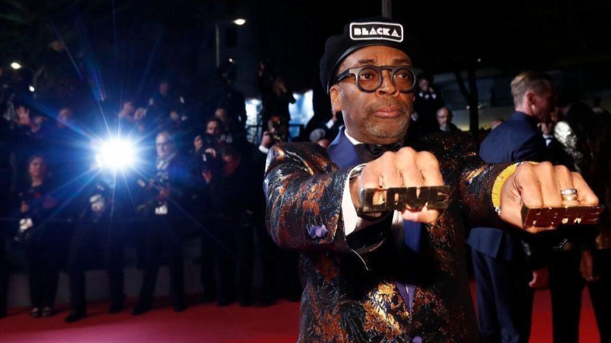 Director Spike Lee leaves the screening of "BlacKkKlansman" during the 71st annual Cannes Film Festival.