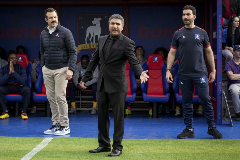 Nate (Nick Mohammed, center) is at the center of the "Ted Lasso" season-two finale, butting heads with fellow coaches Ted Lasso (Jason Sudeikis) and Roy Kent (Brett Goldstein).