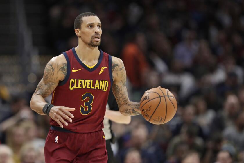Cleveland Cavaliers' George Hill drives against the Toronto Raptors in the second half of an NBA basketball game, Wednesday, March 21, 2018, in Cleveland. (AP Photo/Tony Dejak)